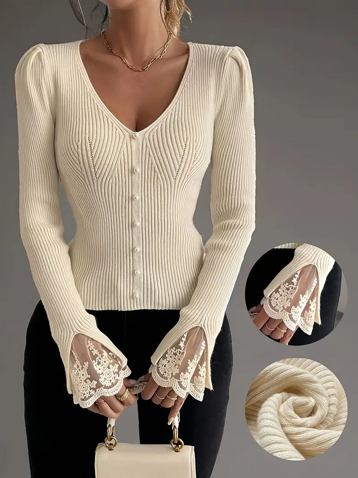 Elegancki sweter z koronkowymi rękawami